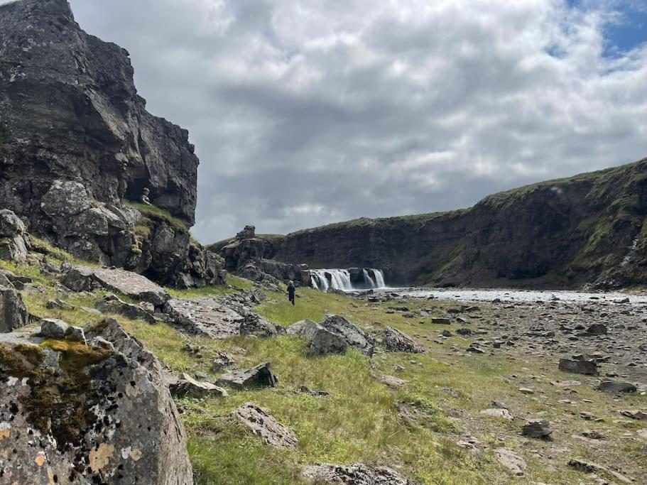 A waterfall in a rocky canyon within walking distance of the farm